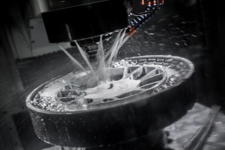 Wheel face on CNC mill with water jets detail