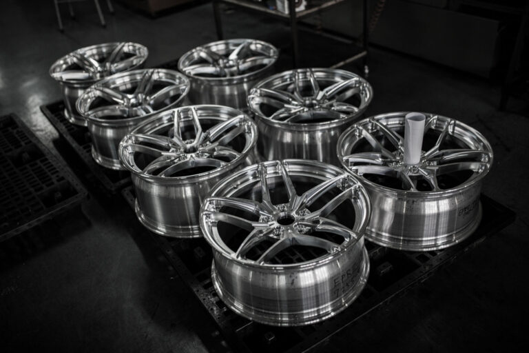 Completed sets of wheels waiting for inspection alternate angle
