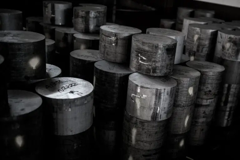 Stacks of aluminum barstock cut to smaller sizes
