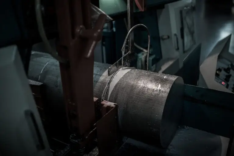 Aluminum barstock being cut detail