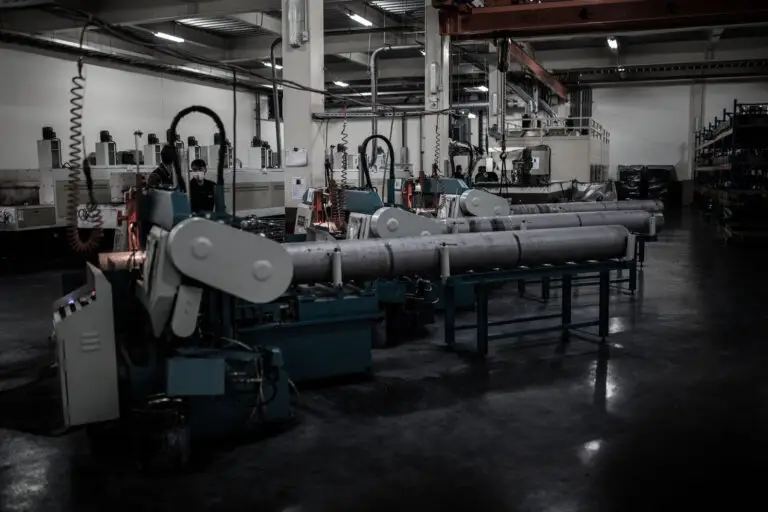 Aluminum barstock being processed